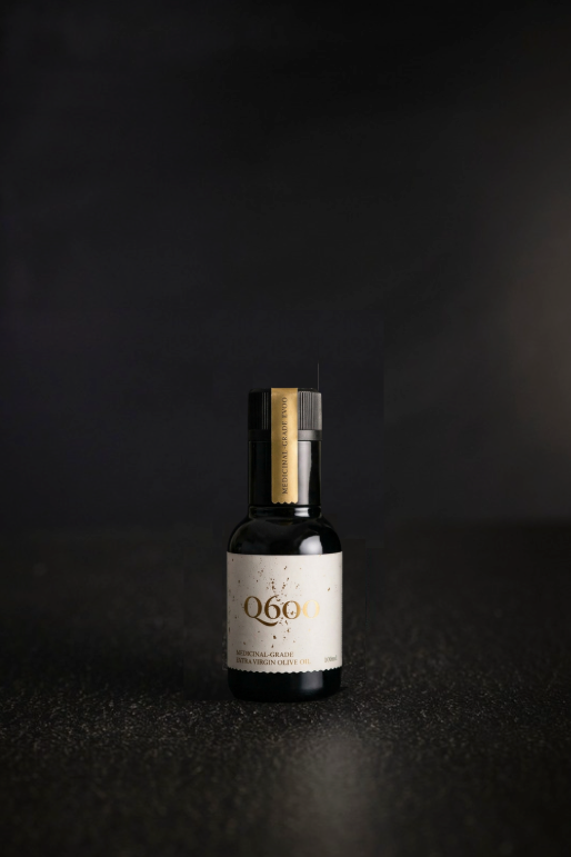Image of black bottle of very high anti-inflammation polyphenol extra virgin olive oil in a small 100ml bottle to protect against oxidation.